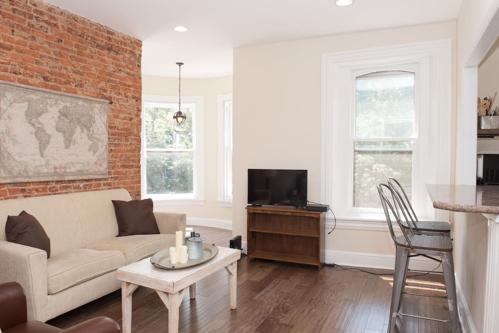 Exposed brick, natural light and open living space make this unit a comfortable and an easy place to stay.