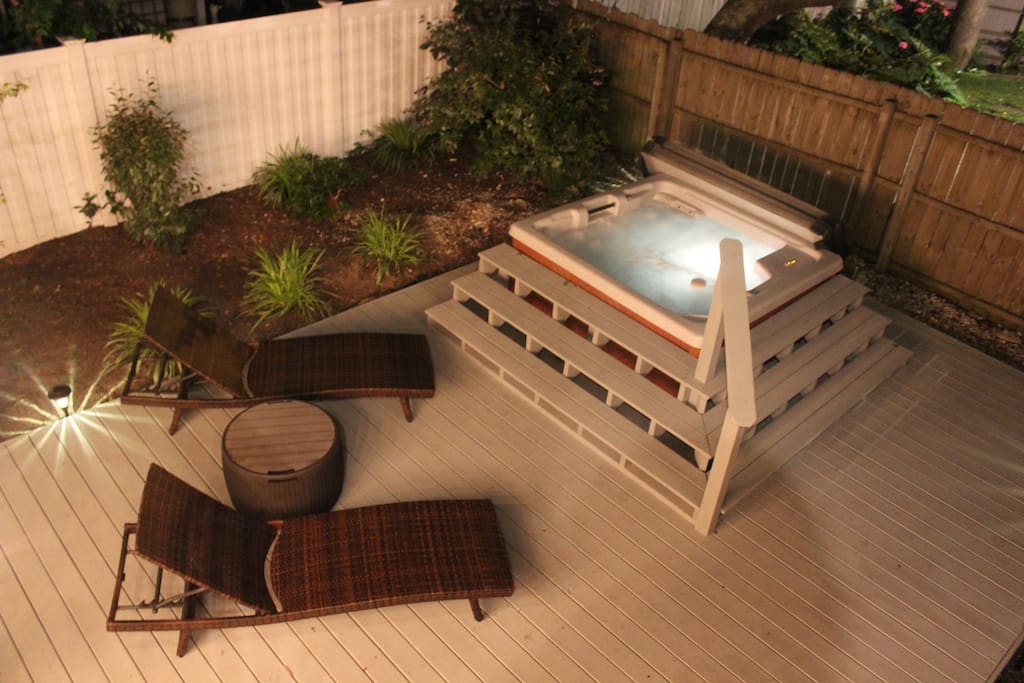With an oversized deck and hot tub for 4, you'll have a hard time choosing between the beach or the back yard
