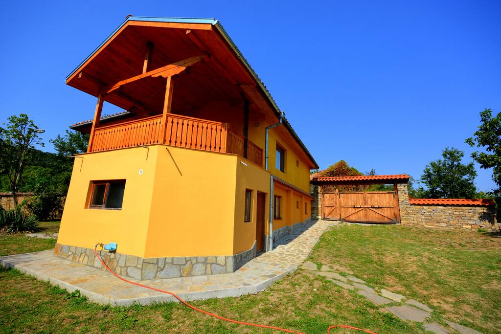 The house with the newly extended balcony and terrace upstairs.