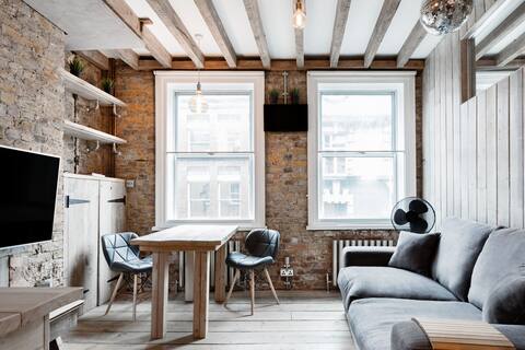 Soho Unique Wood and Brick Suite in the Heart of Soho