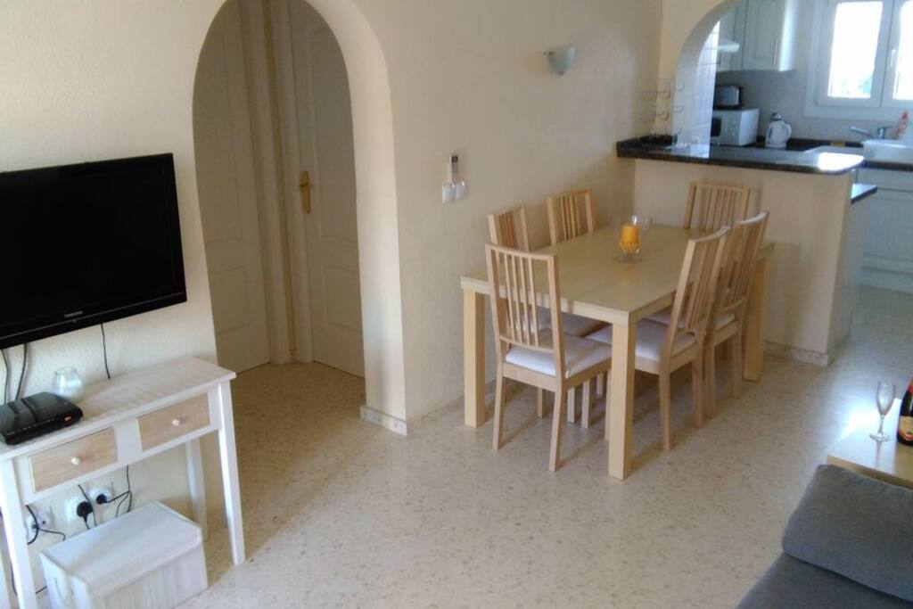 Dining area leading to kitchen