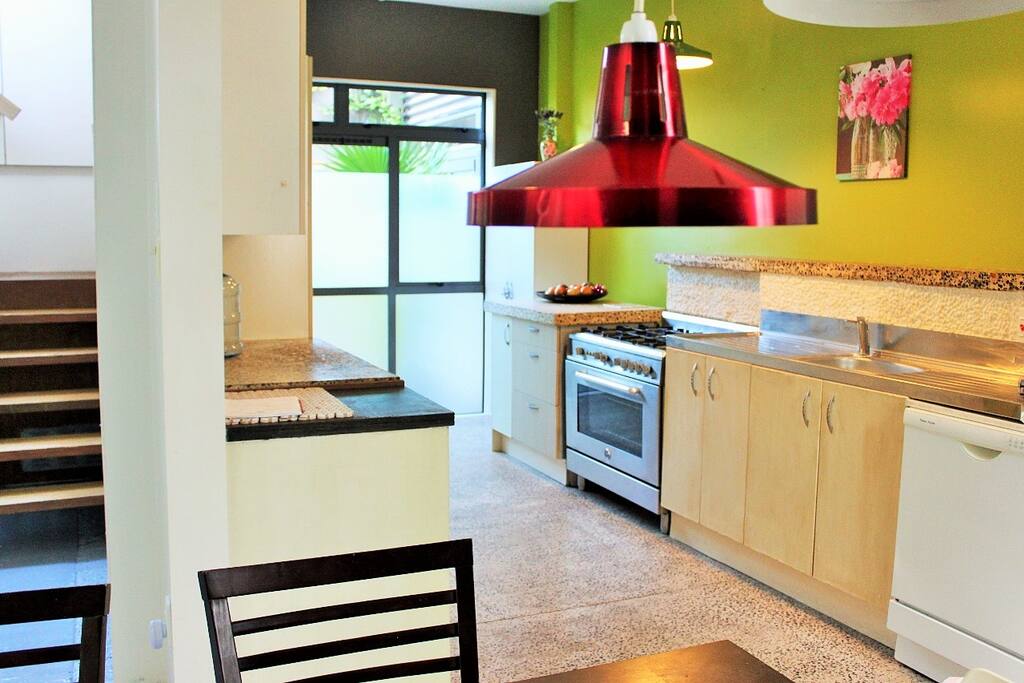 Full self catering kitchen with oven dishwasher and large fridge freezer