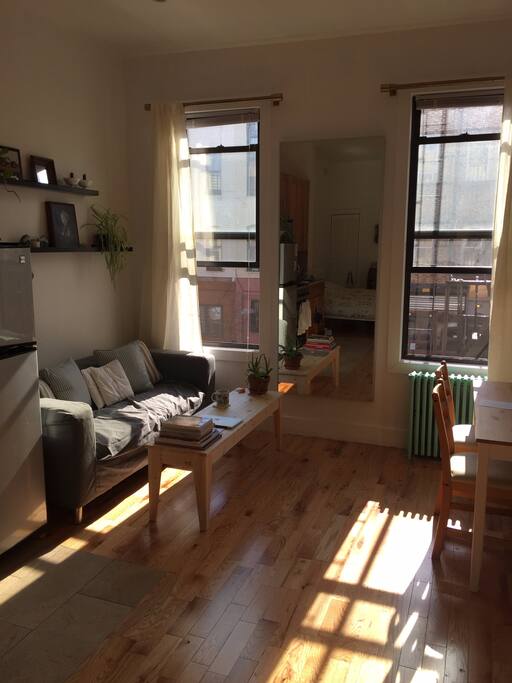 This apartment gets so much natural light! Thanks to southern exposure, you get sun from early morning till last light. The ample hardwood floorspace is the perfect spot for a little yoga or stretching—and a yoga mat is on hand for you to use whenever you like. Plus, don’t forget the full-length mirror.