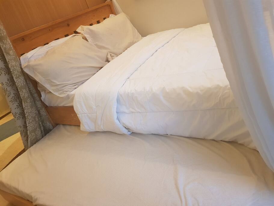The queen-size bed inside the bedroom has a single bed pullout; allowing one more extra adult to comfortably fit in