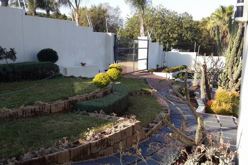 Garden view from room - note security gates and electrical fence