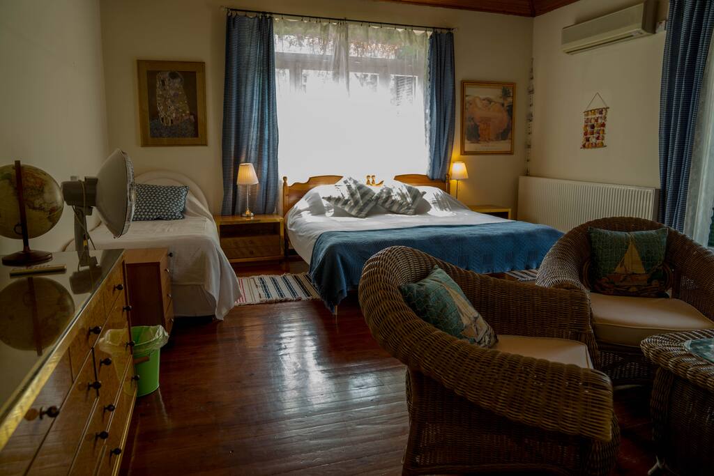 Huge bedroom with Double Bed, plus a single bed for a third person, Walk out balcony, comfortable sitting area, Laptop friendly work space, fast 120 Mbs internet connection and Private Bathroom