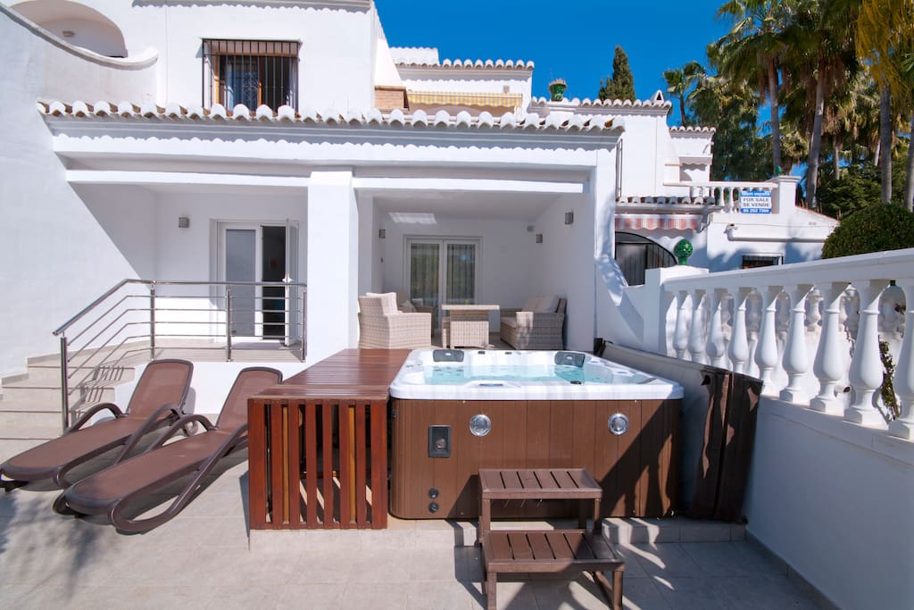 Terrace with Hot Tub , sun loungers and seating area