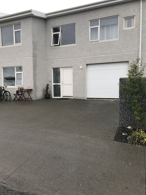 Street view. In front of the house