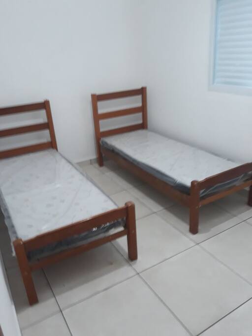 Quarto 1 com ventilador de teto