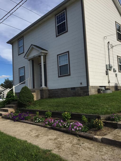 My humble abode. I put in this flower garden over the summer and hope to expand it because I don't like to Mow. :)