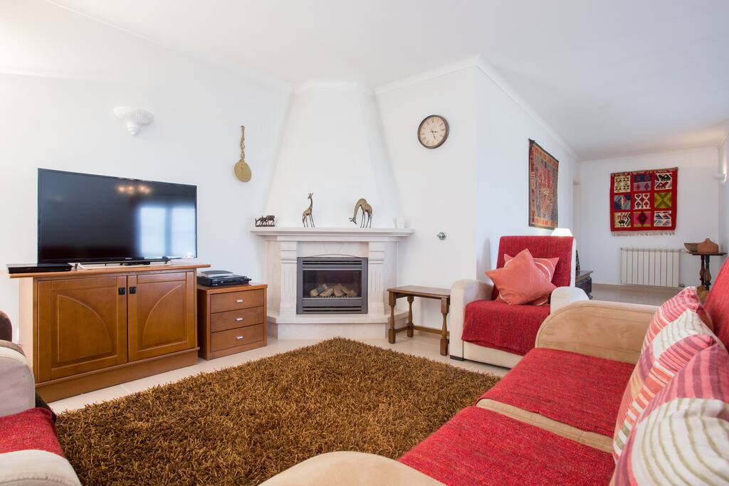 Seating area around TV and fireplace