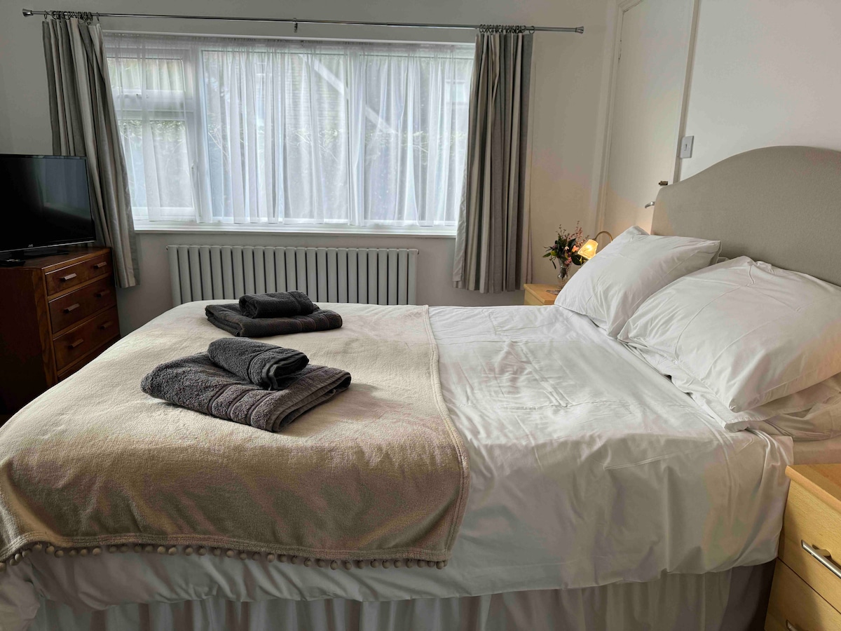 The bedroom with a comfortable king size bed.