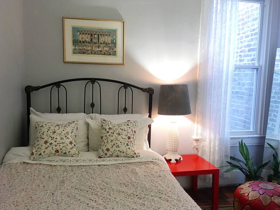 The room features a comfy double bed. The door has a lock and key for you to use as you like