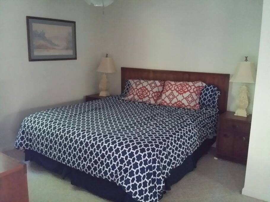 king size bed in the upstairs bedroom.