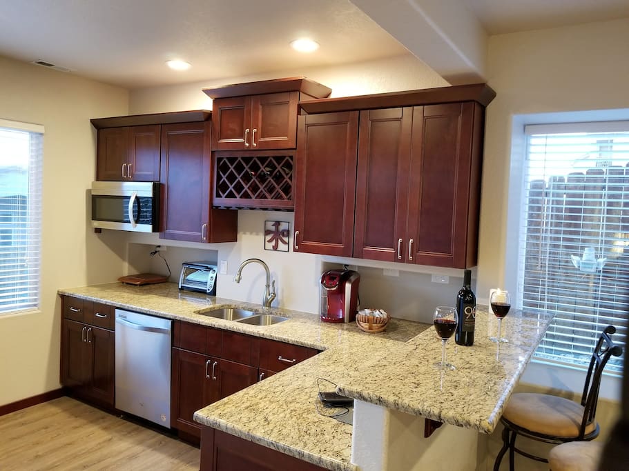Kitchen-Like Wet Bar with: Microwave, Dishwasher Induction Hot Plate, Keurig Single Cup Coffee Maker.