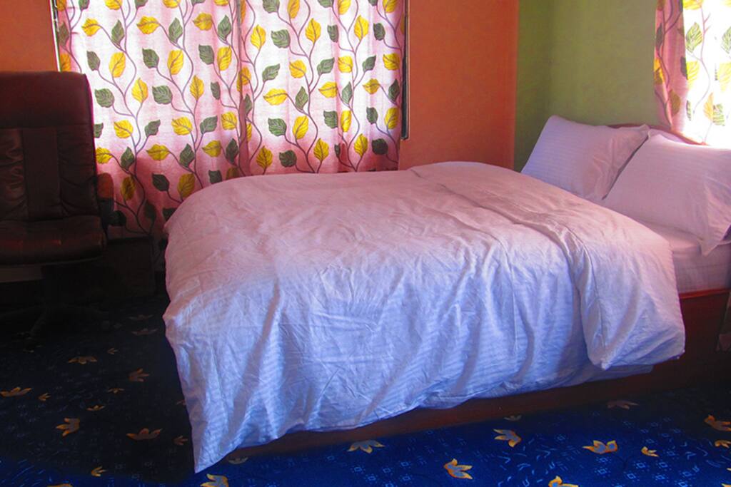 Double Bed with attached Bathroom