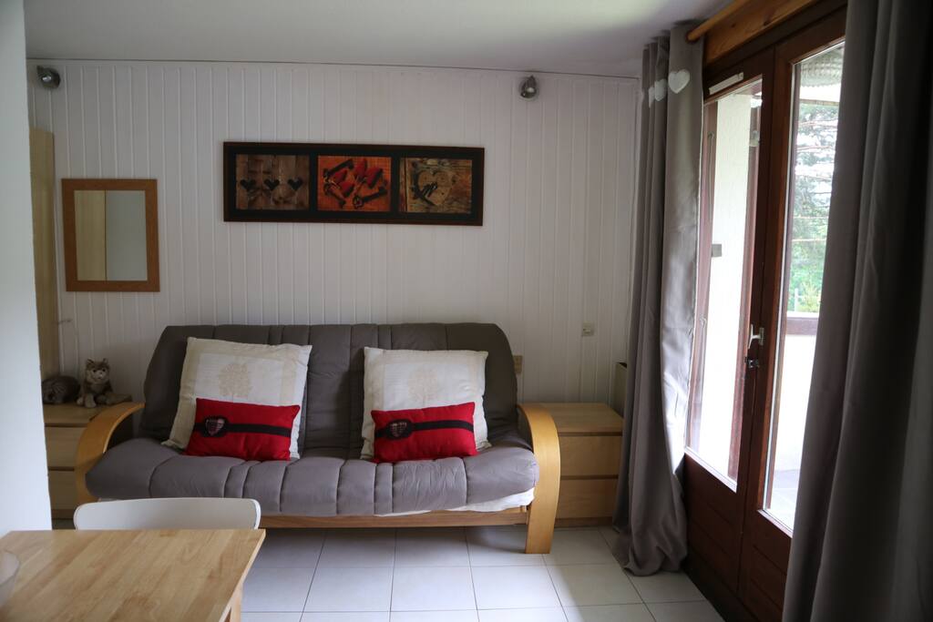 Lounge with sofa bed converting to double