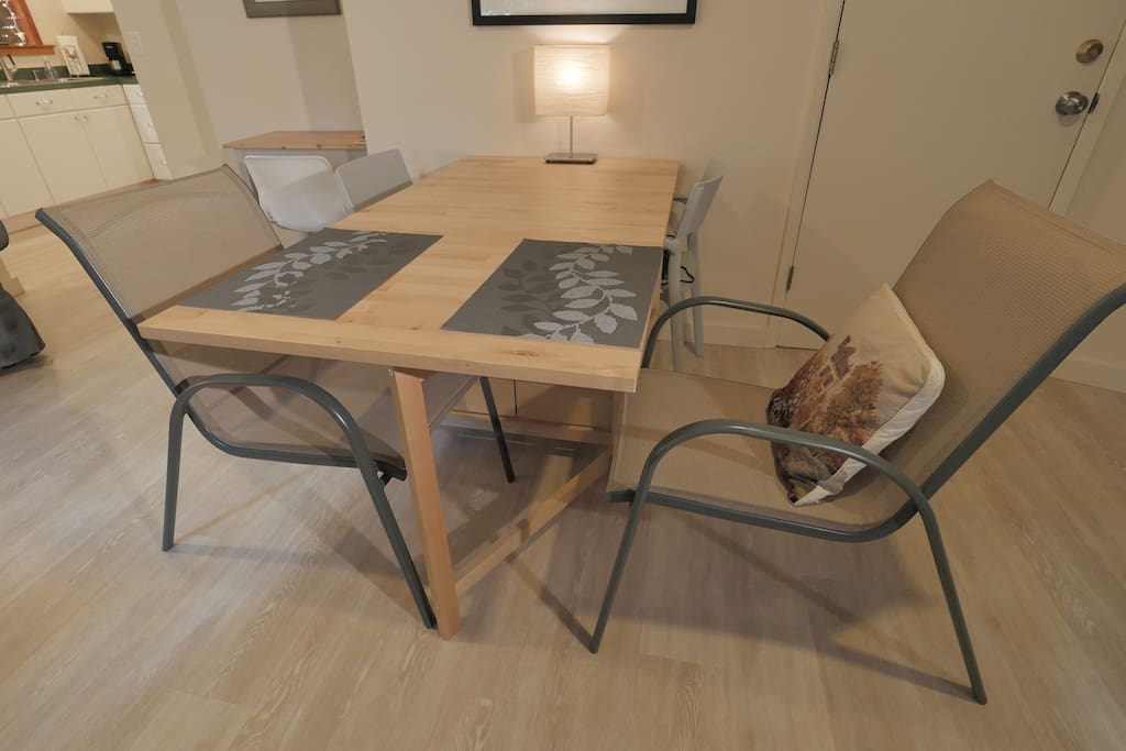 Table extends to seat four.