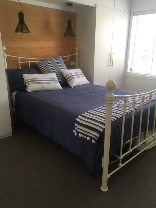 Master bedroom with queen bed