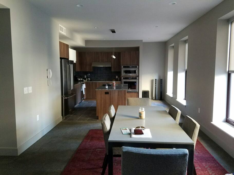 An open kitchen that extends into the dinning room that sits 6. Enjoy a dinner or meeting while you overlook East 9th street.