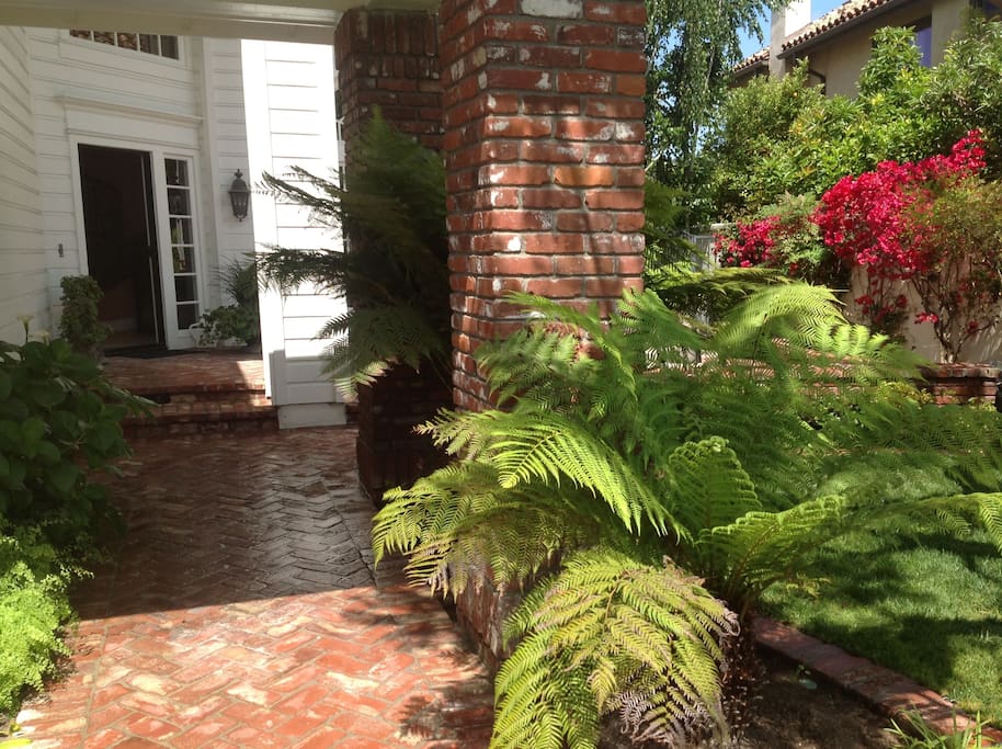 Lush landscaping in private guarded community.