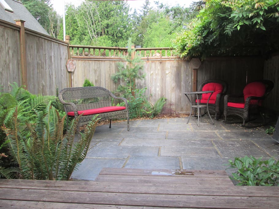 The back patio is an oasis to enjoy a morning cup of coffee or an afternoon cocktail. Guests have total privacy in this sweet spot.