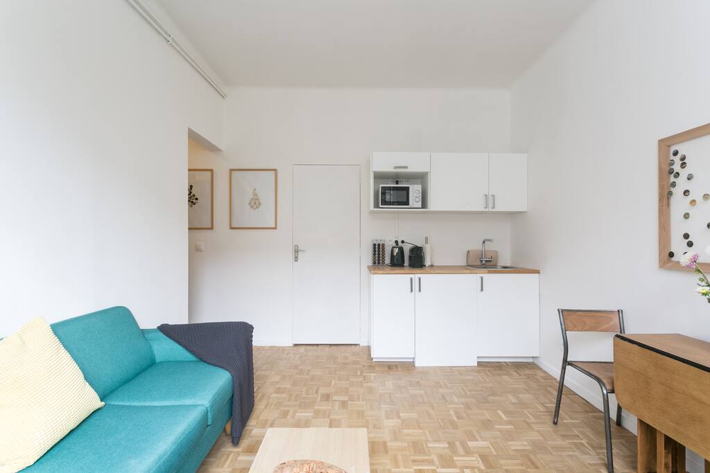 Main room with a simple kitchen.