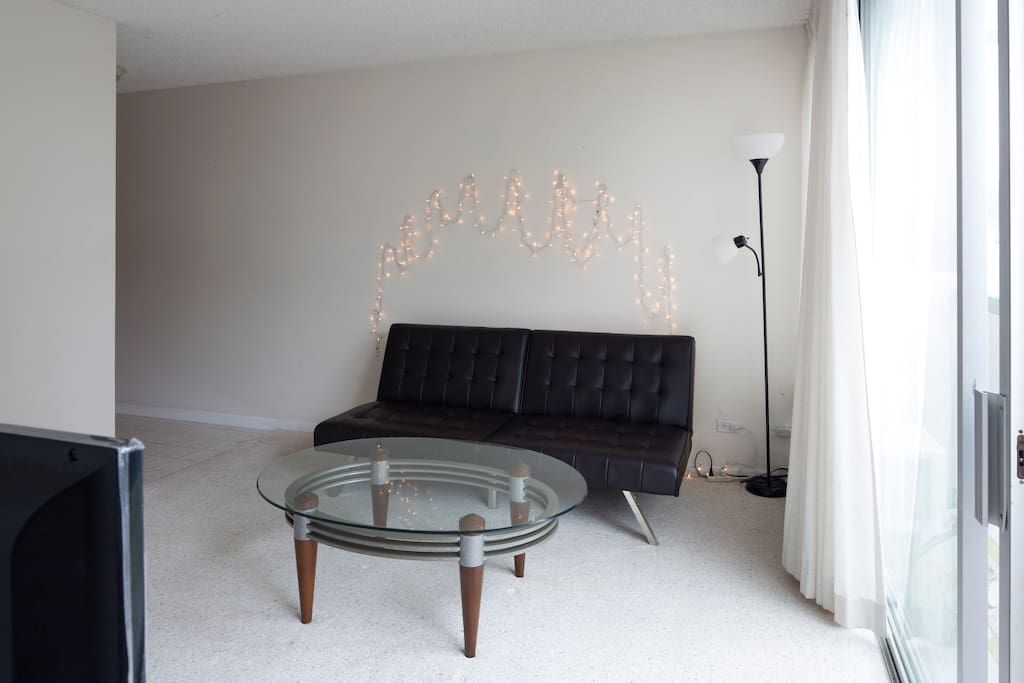 Living room with Full size futon sofa bed