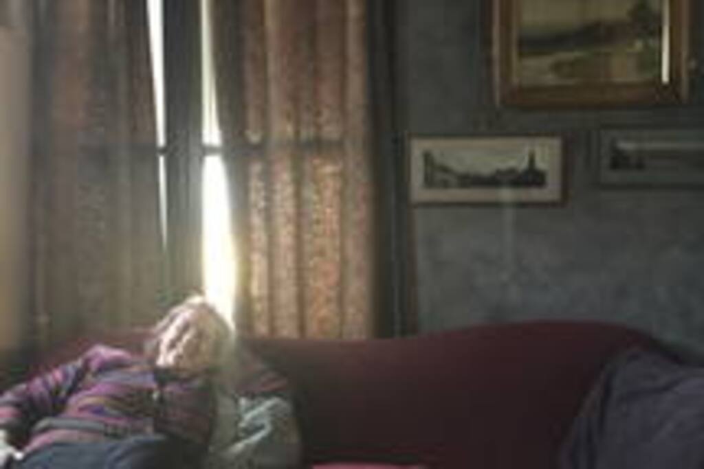 A happy guest relaxing in the Theatre.