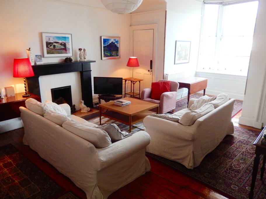 The livingroom January 2018. Comfortable and spacious with fine views north over Edinburgh to Fife.