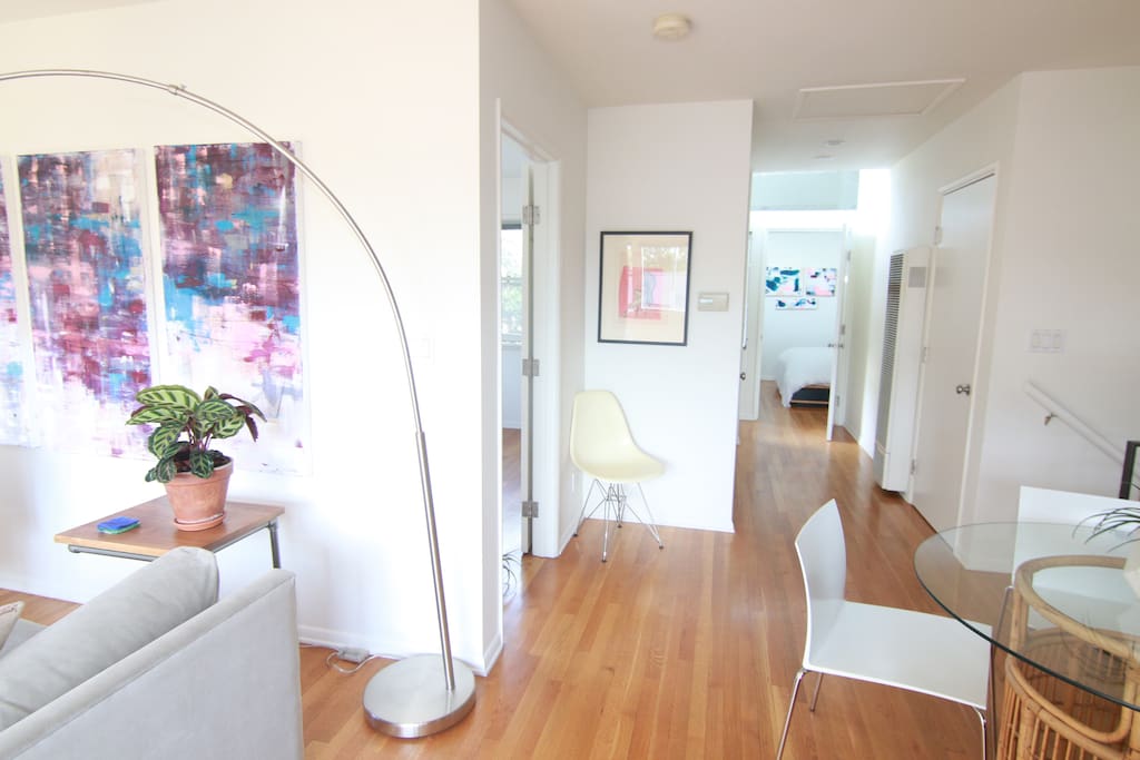 View of hallway leading to two bedrooms and bathroom