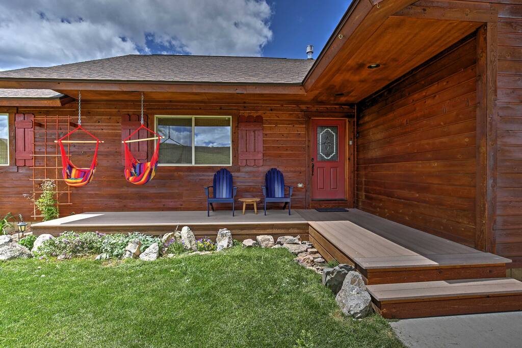 Front porch is a great place to sip coffee or a summer beverage while gently rock in a hammock chair.