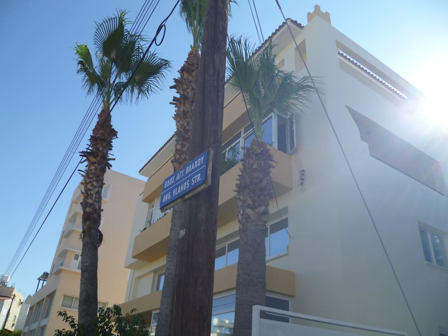 Another view of the building with the street sign.