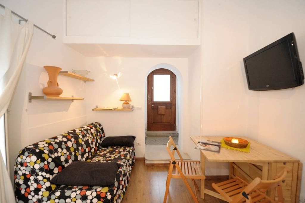The living room and the entrance