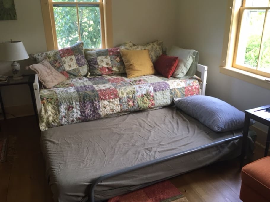 Comfy day bed turns into a trundle for two