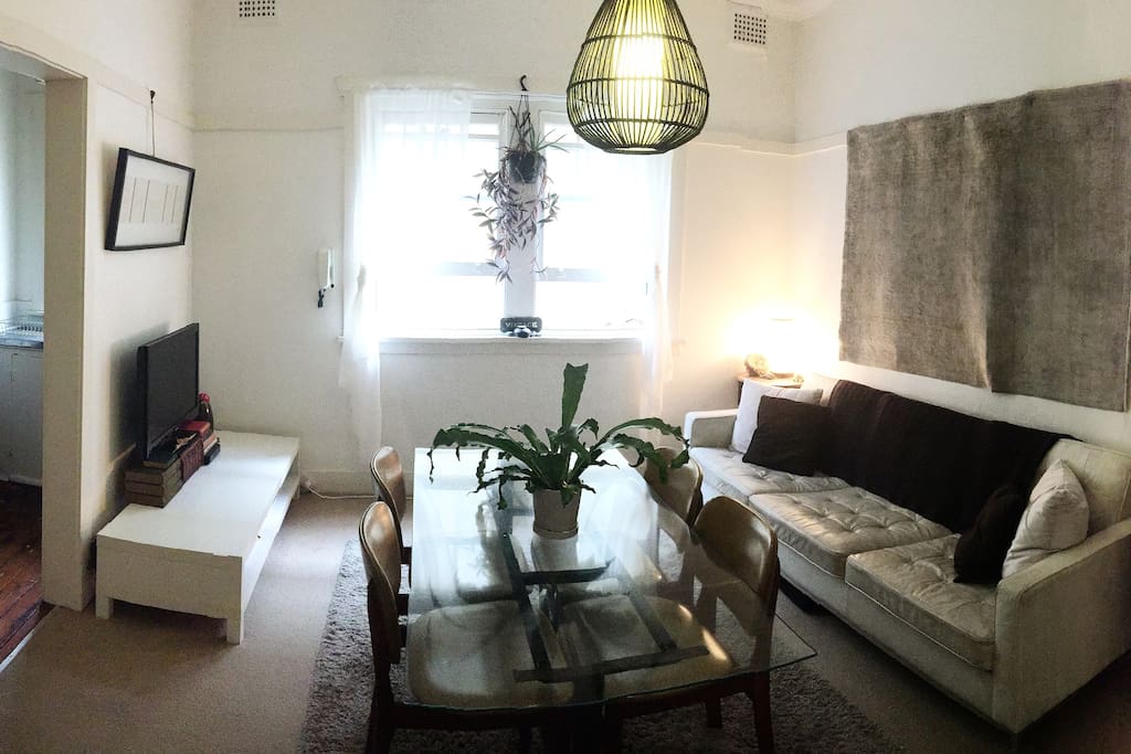 The living room/kitchen/hallway