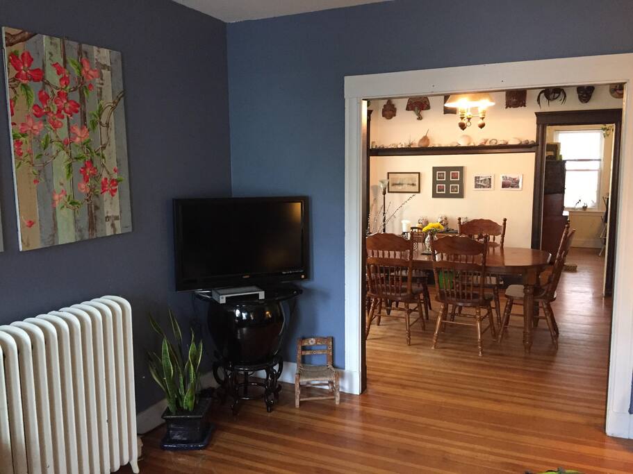 Living room and dining room available for guest use, with TV and DVD/Blu-ray player.