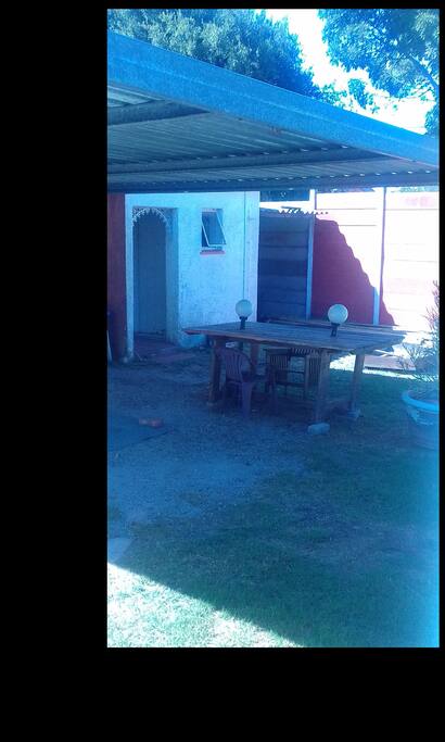 Safe undercover parking behind locked gates. Outdoor braai area