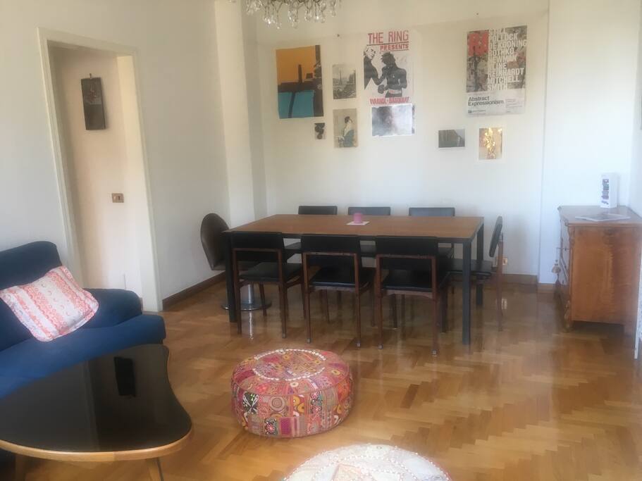 2nd living room with dining table and large sofa
