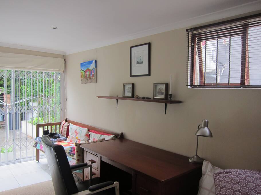 work space overlooking lush kitchen garden