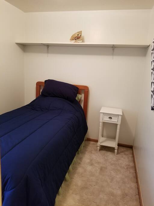 Extra-long twin bed.