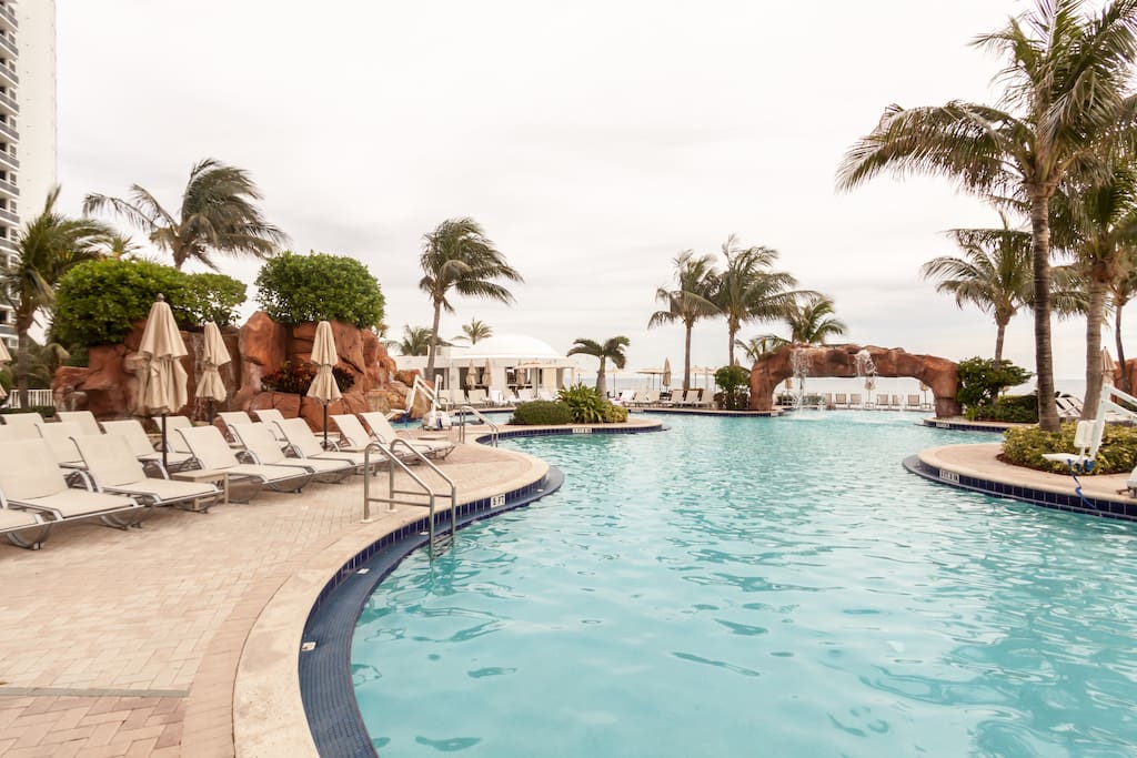 Enjoy taking a dip and swimming laps in this huge heated pool or simply enjoy the Sunny Isles breeze, lounge by the poolside and get a much-deserved tan