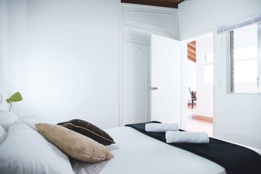Great Private bedroom. Double bed, closet, night stand, lamp, desk/workspace.