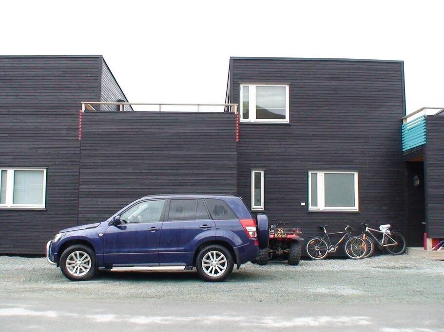 The entrance and parking in the street