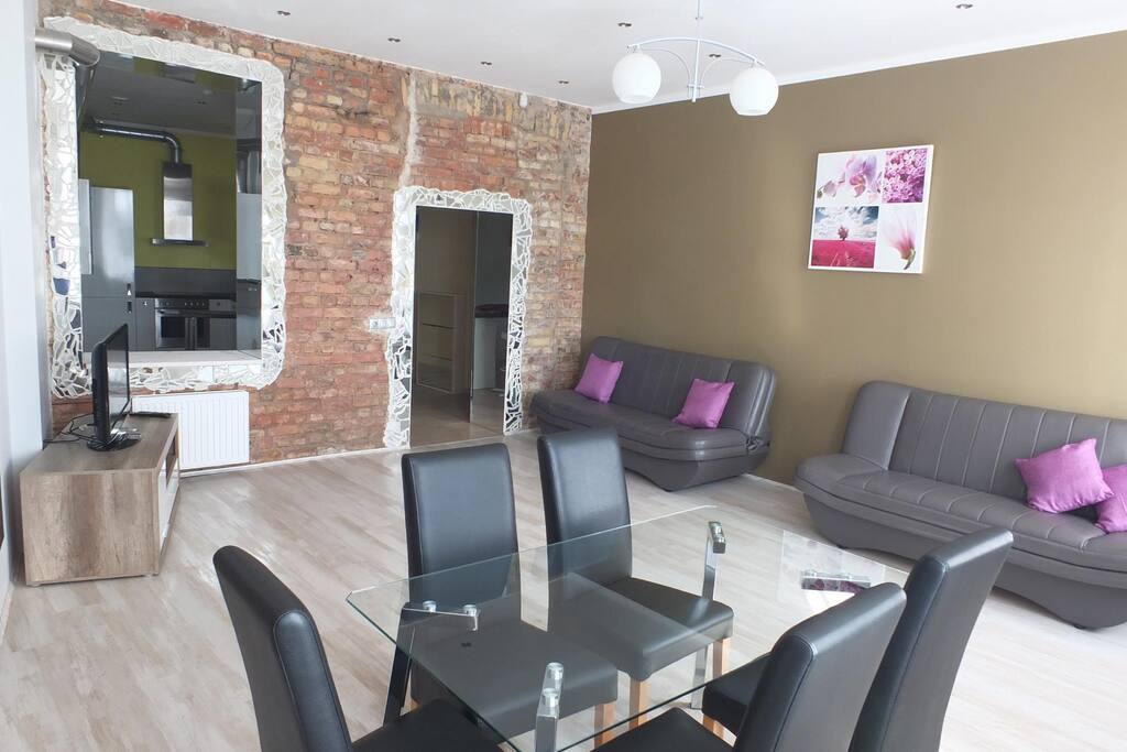 Living room with two folding beds sofa