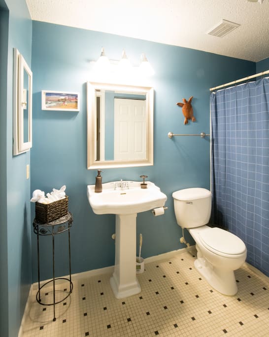 Vibrant bathroom with homemade soap and fresh linens.