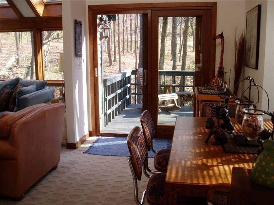 Wine or beer in hand, head for the deck.. view of the woods & brook included