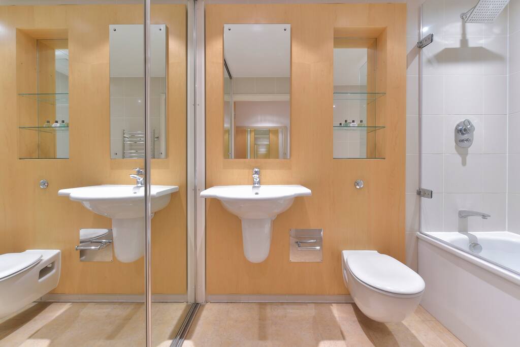 Full bathroom with shower over bath