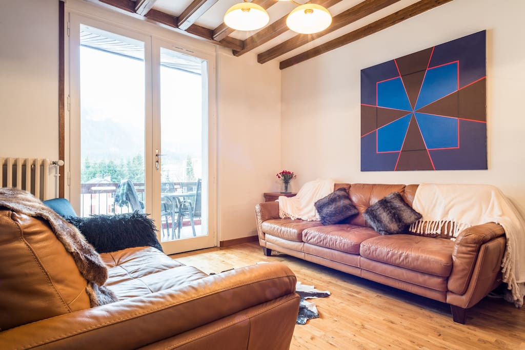 The sitting room leads onto the spacious balcony