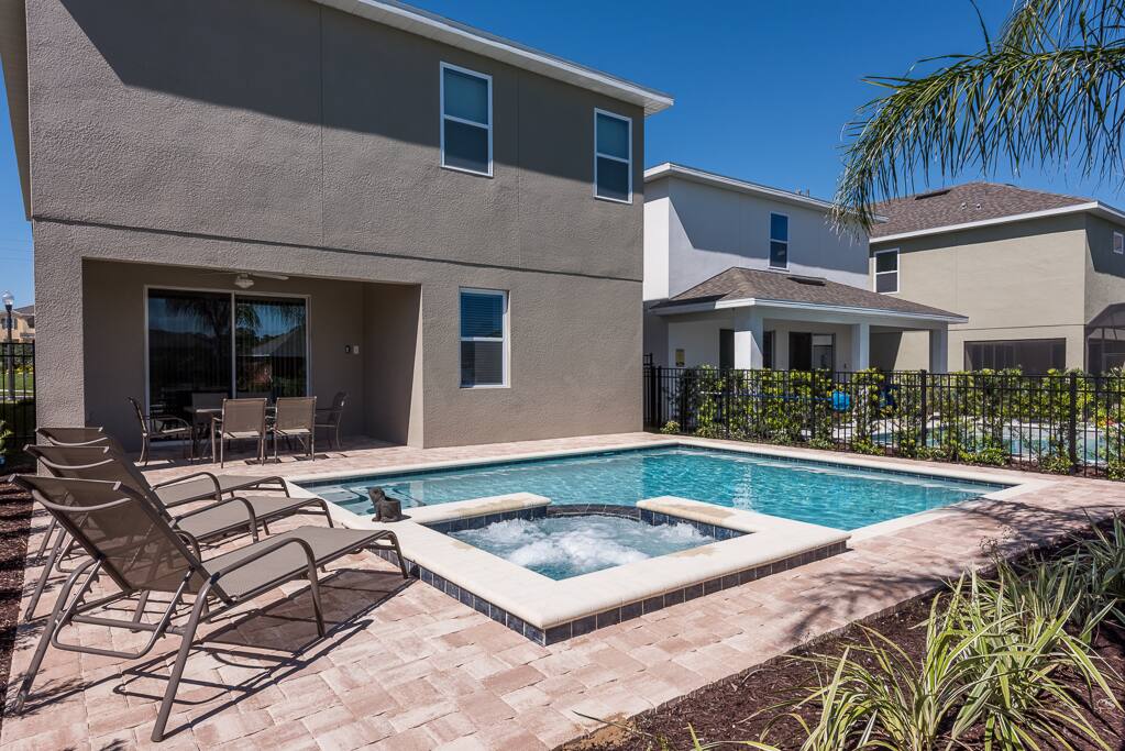 Pool area with tables and Sun Seats